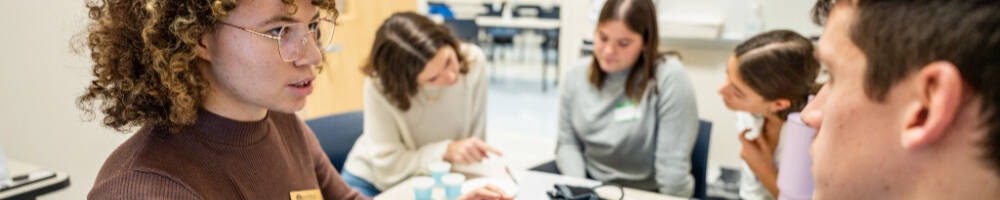 Students hold a discussion in a classroom